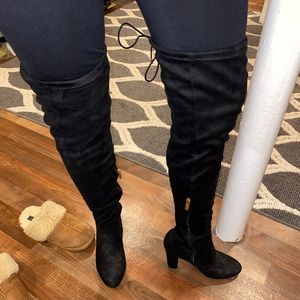 Over the knee heeled boots.